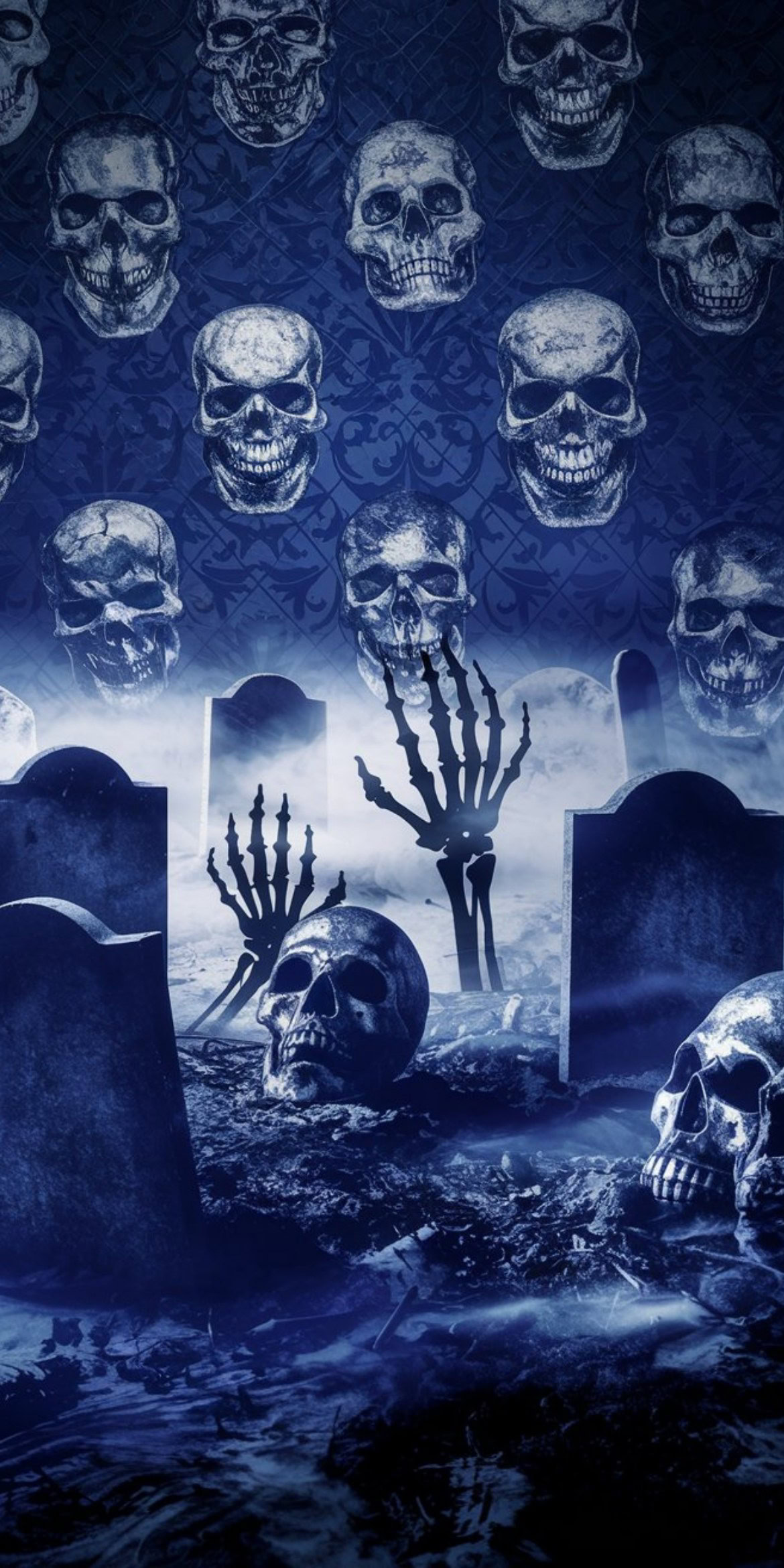 107+ Free Halloween Wallpapers To Download 68 Eerie graveyard scene with tombstones and skulls; skeletal hands emerging from the ground, surrounded by mist. Skulls form a haunting wallpaper above.
