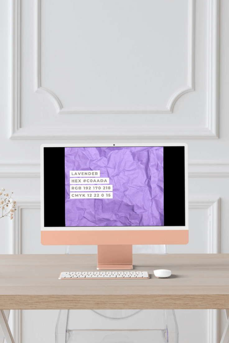 Calming Coastal Premium Canva Color Palette 4 canva calming coastal color palette on a mac monitor screen on a table with keyboard and mouse