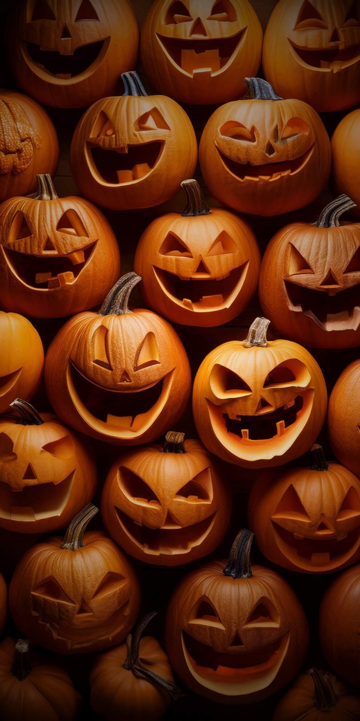 107+ Free Halloween Wallpapers To Download 3 a group of carved pumpkins